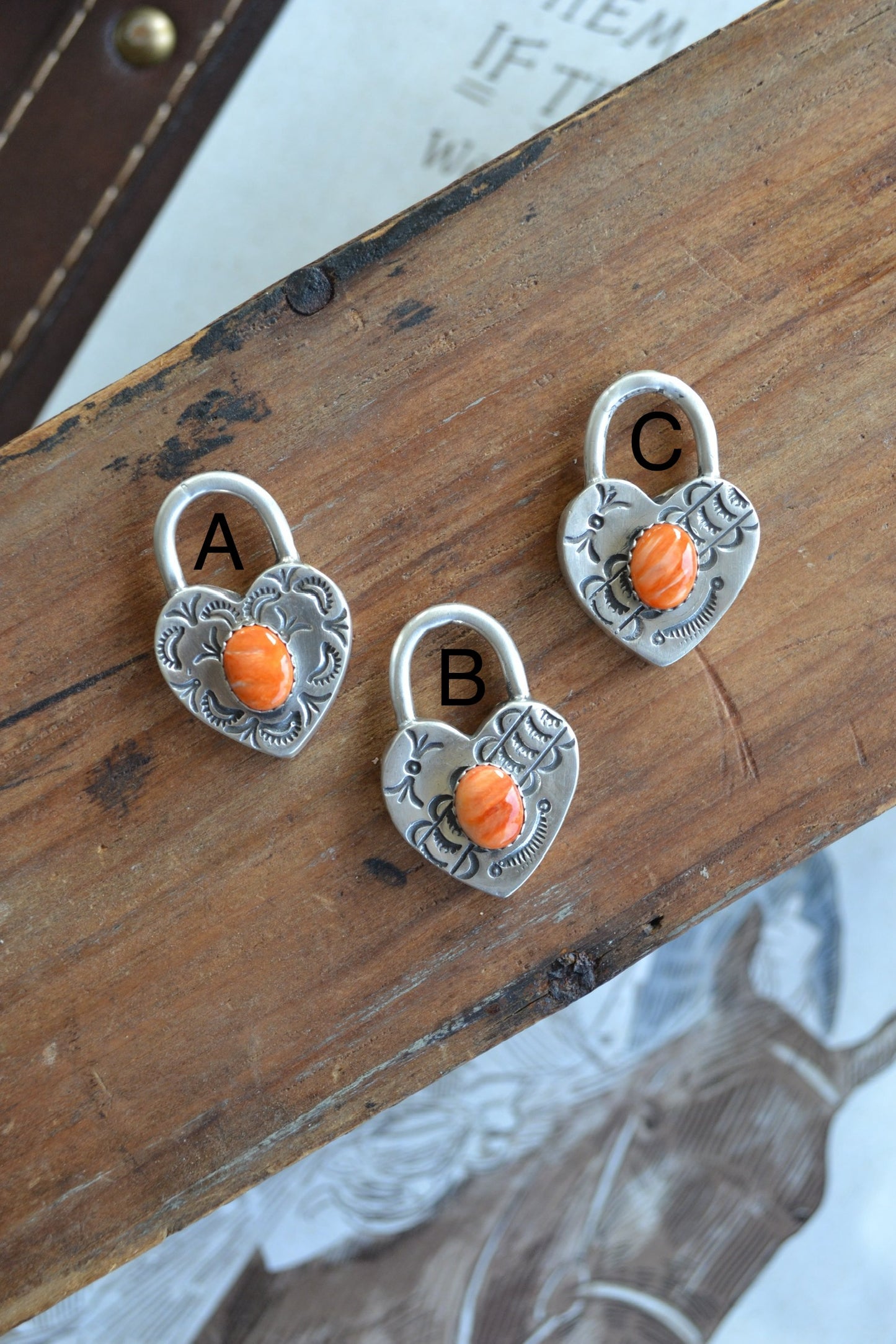 The Royce Orange Spiny Heart Pendants