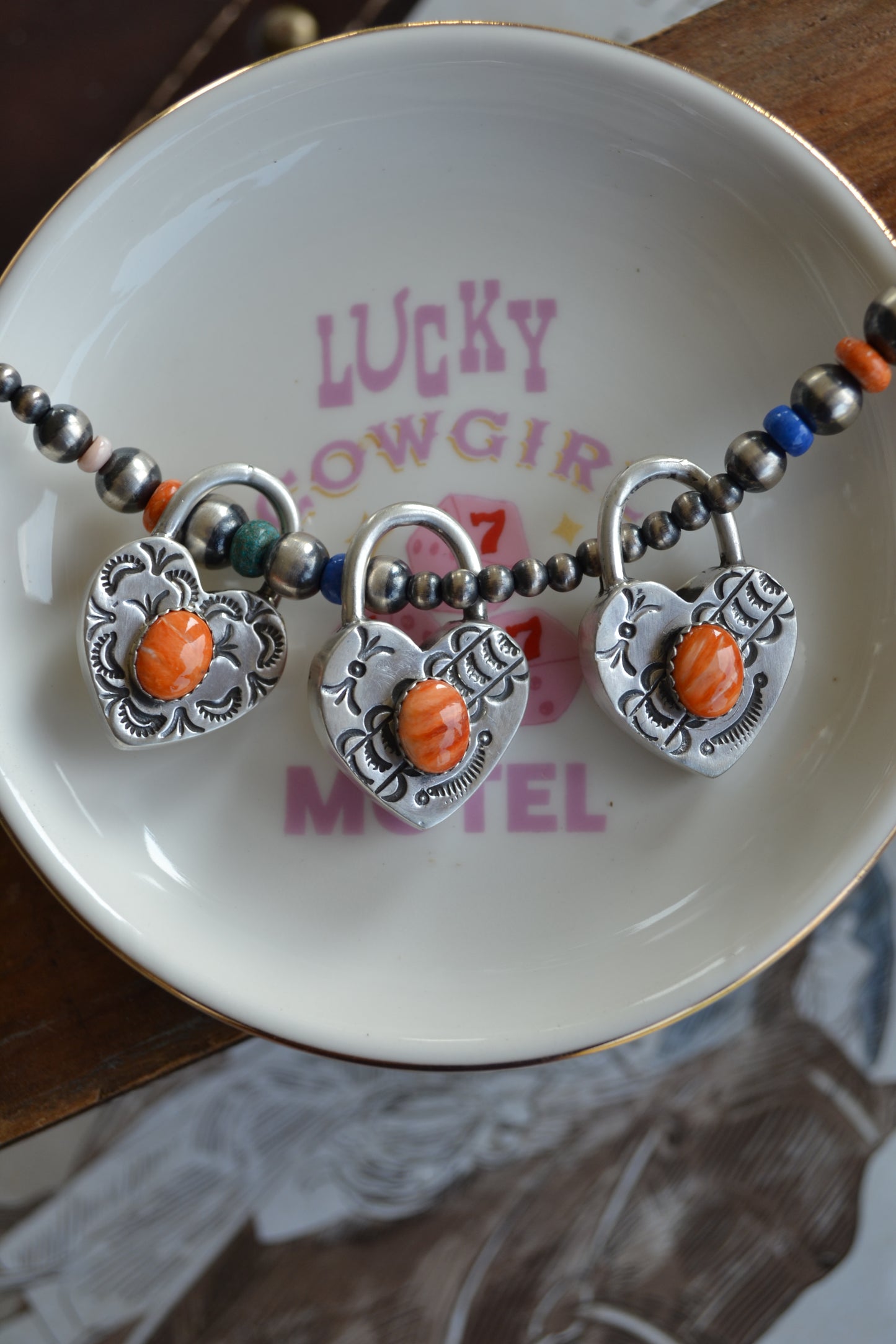 The Royce Orange Spiny Heart Pendants
