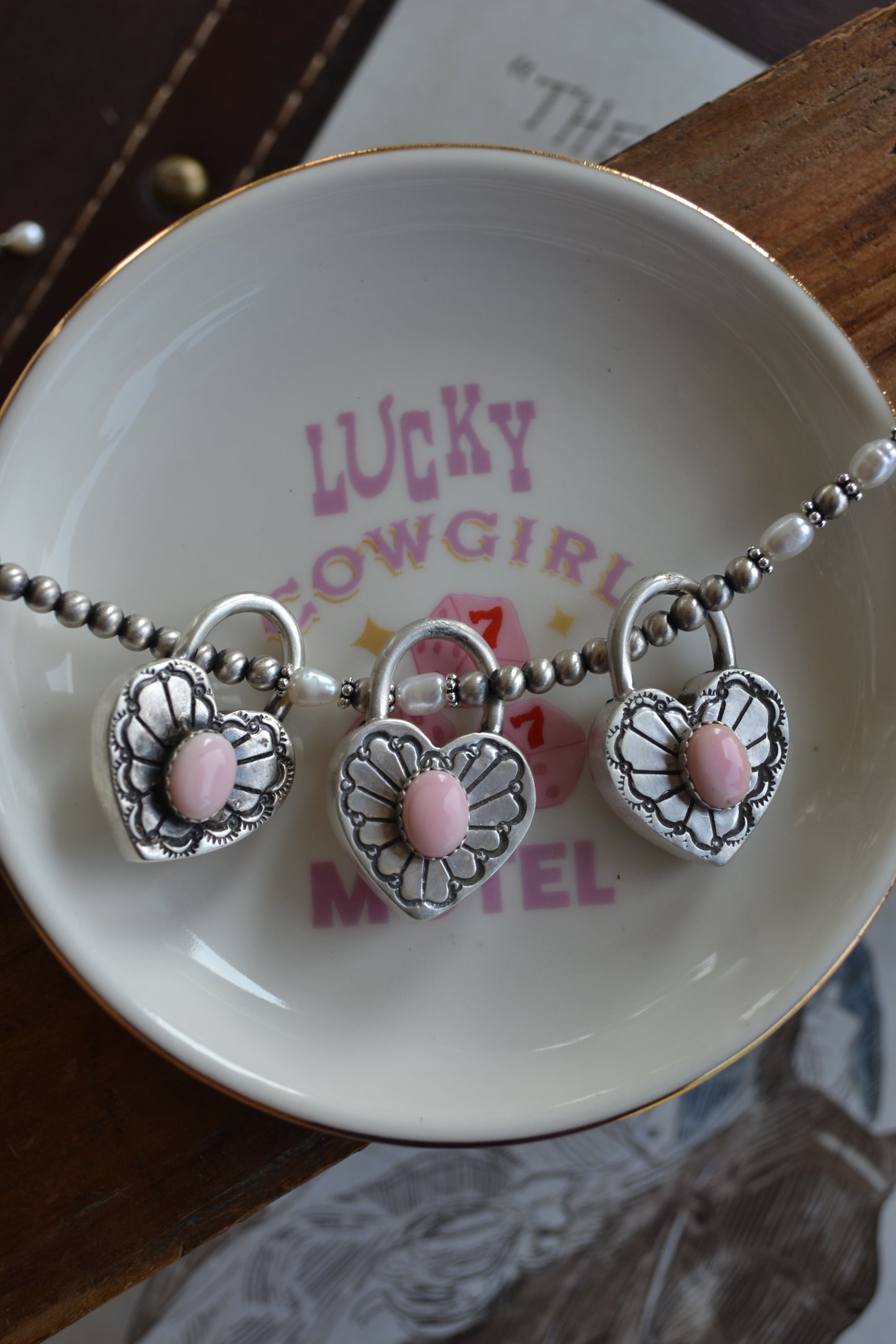 The Royce Pink Conch Heart Pendants