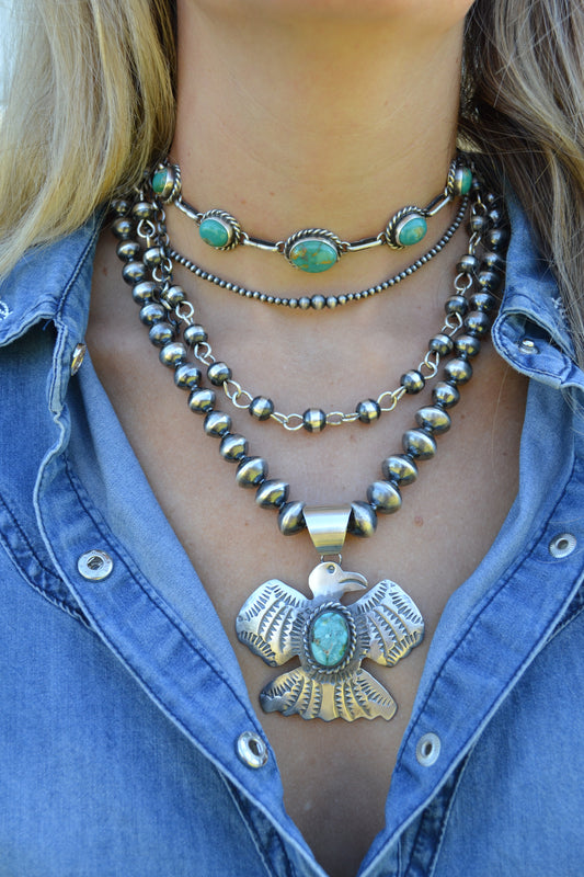 chimney butte turquoise thunderbird pendant