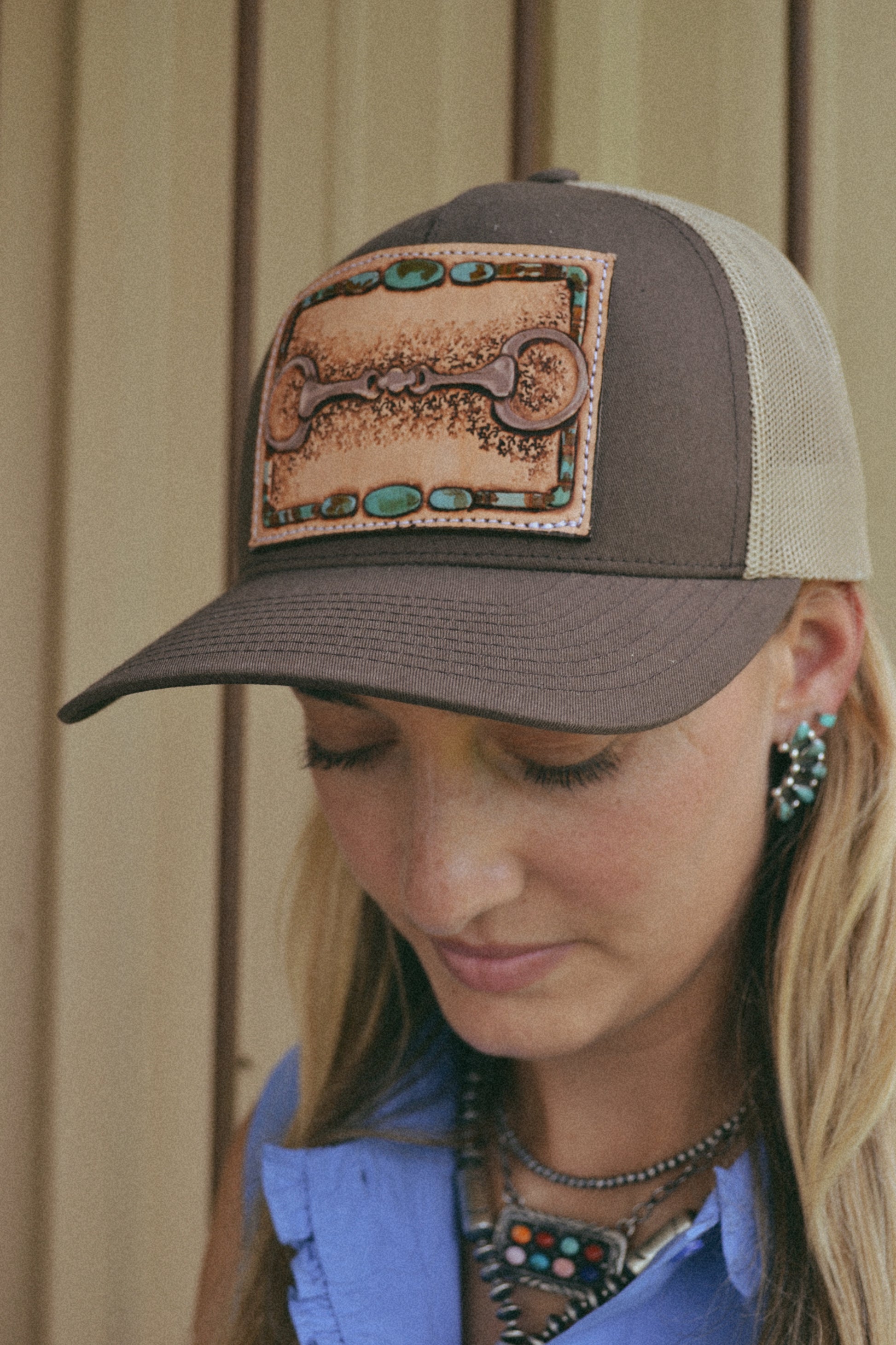 tooled leather snaffle bit trucker hat