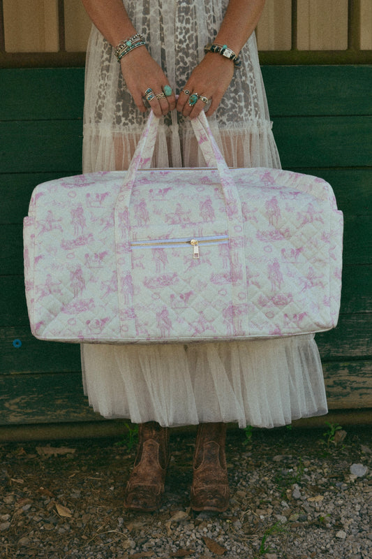 Pink cowgirl print duffle bag 