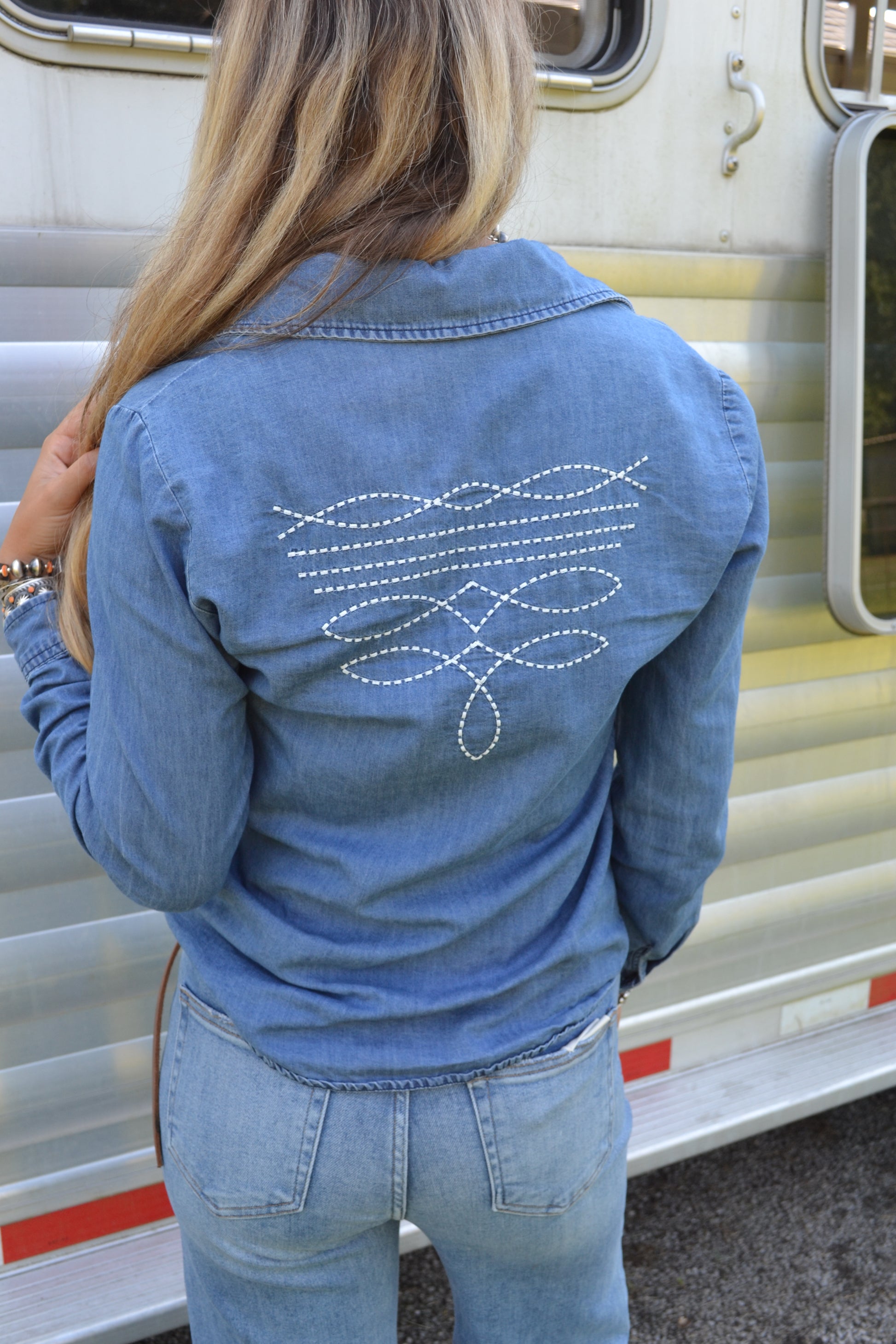 boot stitch embroidered denim pearl snap long sleeve top