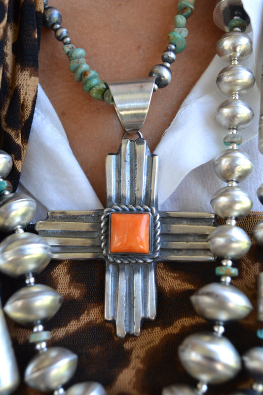 large orange spiny chimney butte zia cross pendant