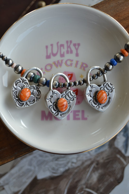 The Royce Orange Spiny Heart Pendants